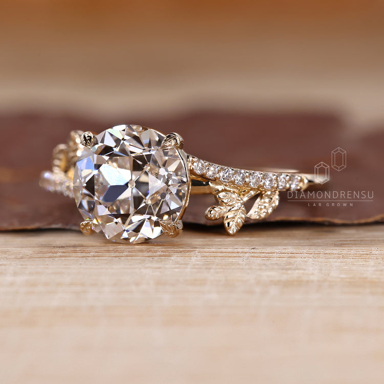 Lab grown round old cut ring pave nature style.