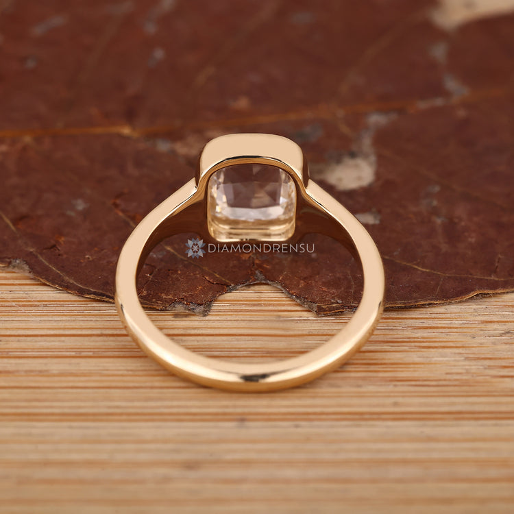 IGI certified cushion rose diamond ring bezel set.