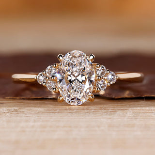 Oval cut diamond ring seven stone muse cathedral set.