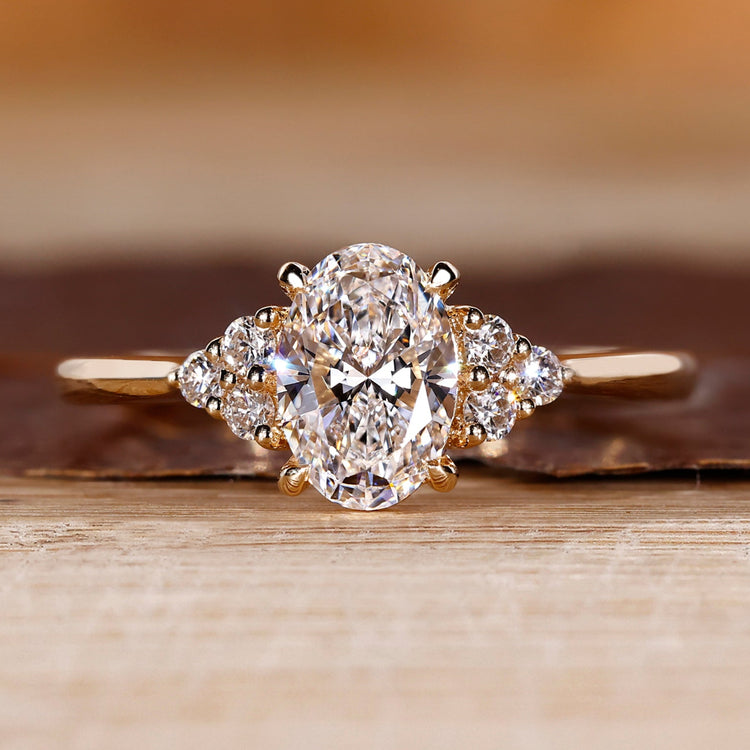 Oval cut diamond ring seven stone muse cathedral set.