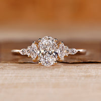Oval cut diamond ring marquise round muse tapered shank.