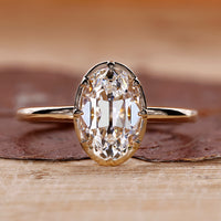 Oval old European cut diamond ring eight claw prong.