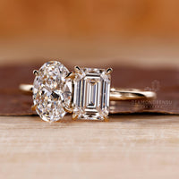 Lab grown toi et moi ring emerald oval diamond.
