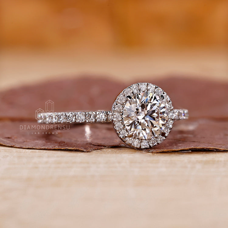 4 prong setting round diamond engagement ring.