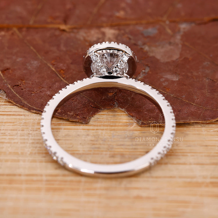 Lab grown round cut pave diamond engagement ring.