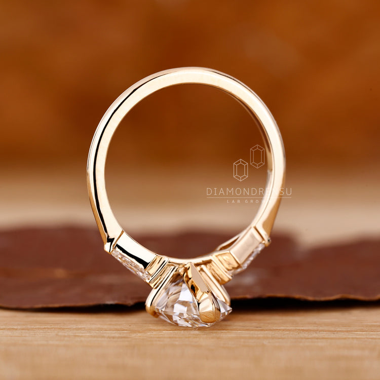 Yellow Gold Ring with Dutch marquise and kite cut accents.