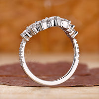 Round diamond curved wedding band.