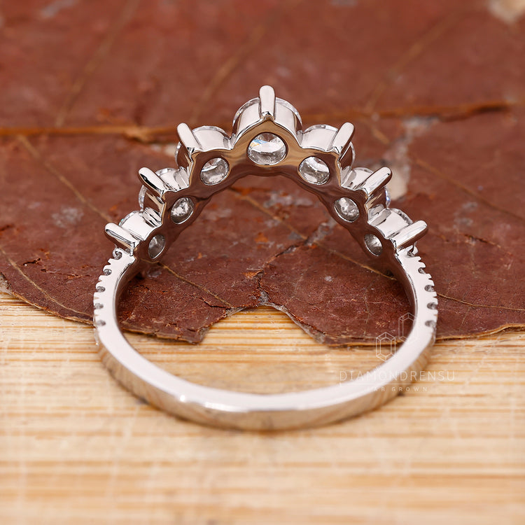 Curvy white gold stacking band.