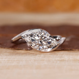 East West Engagement Ring with marquise cut lab grown diamond.