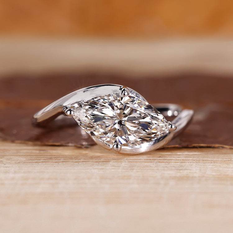 East West Engagement Ring with marquise cut lab grown diamond.