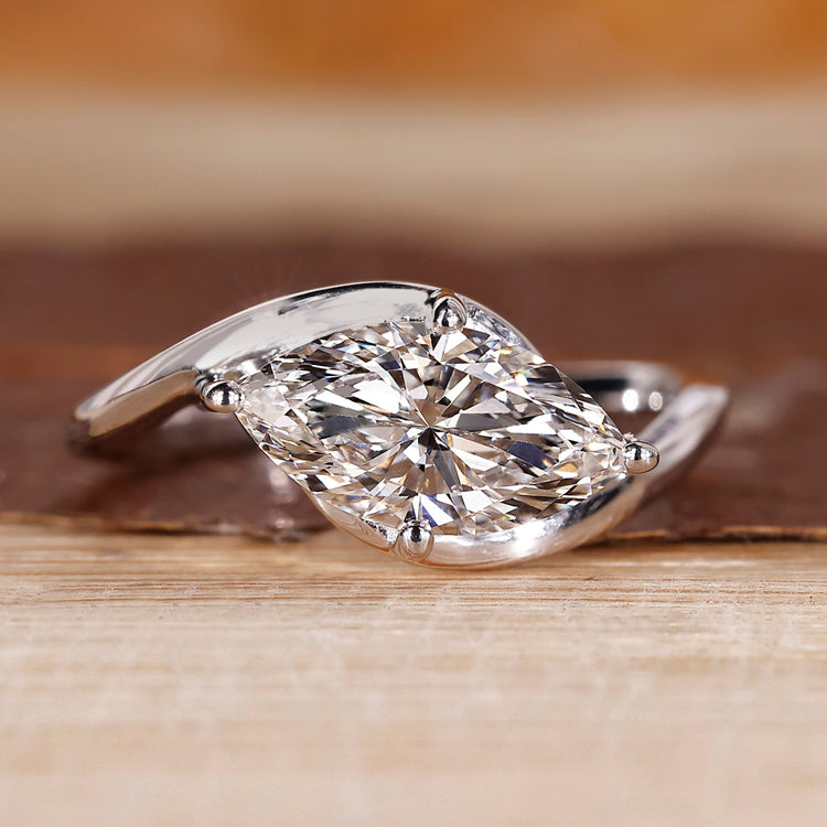East West Engagement Ring with marquise cut lab grown diamond.