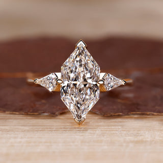 Three Stone Engagement Ring with Dutch marquise center diamond.