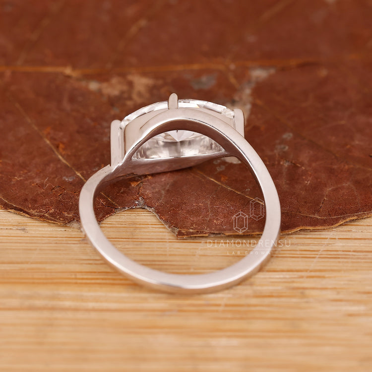 Buy Diamond Ring with east west marquise cut layout.