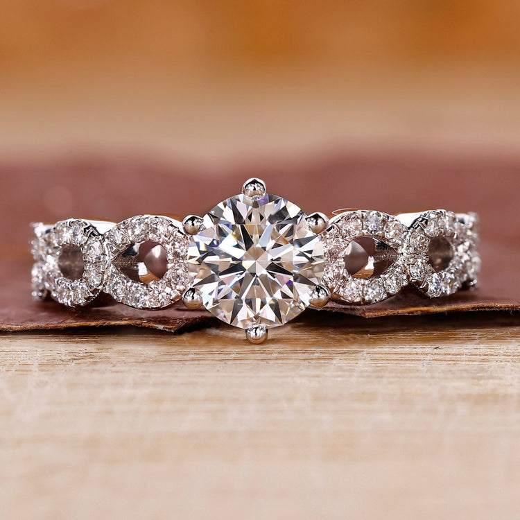 Round cut diamond ring in white gold ring.