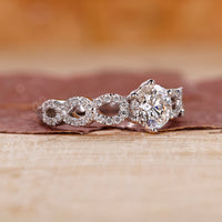 Buy engagement ring with twisted pave ring.