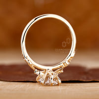 Leaf-inspired diamond ring crafted in yellow gold.