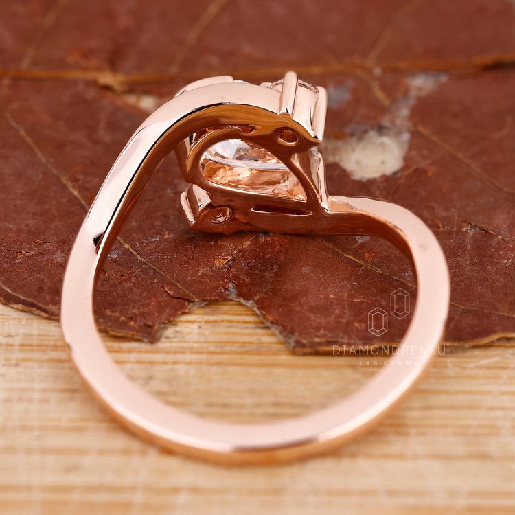Designer three stone engagement ring design.
