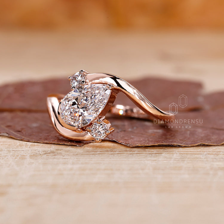 Lab grown three stone diamond engagement ring.
