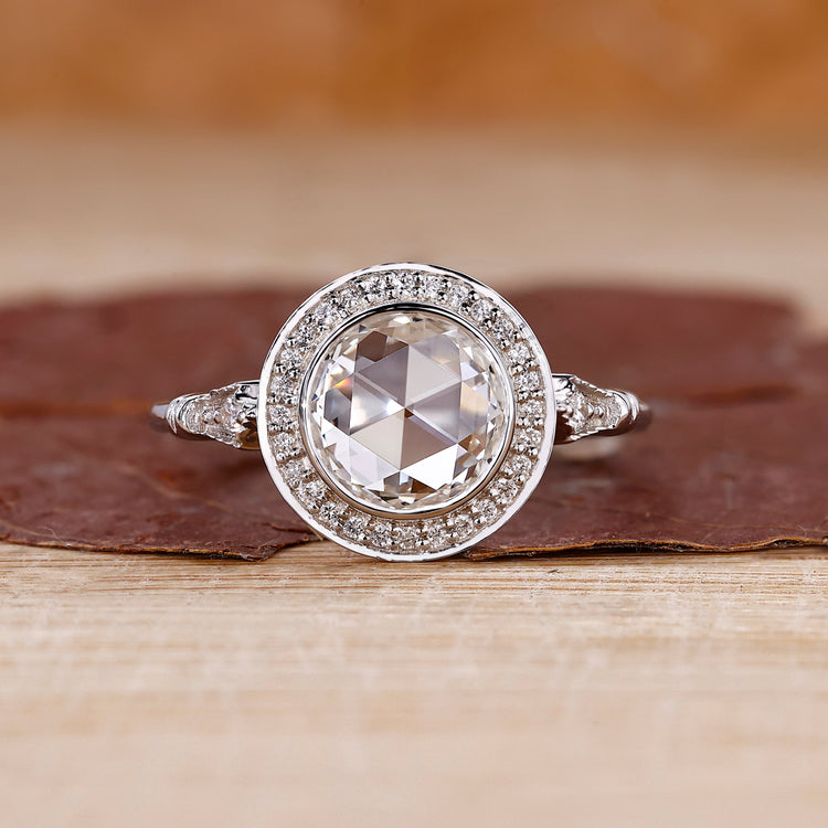 3 stone diamond ring with round rose cut ring.