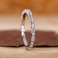 Baguette diamond wedding band in white gold.