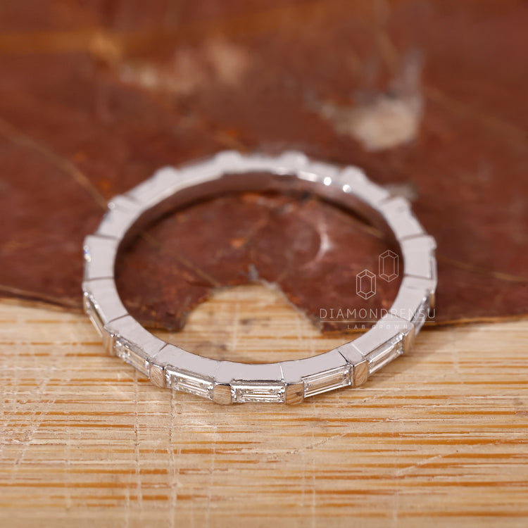 Diamond stacking band in bar setting.