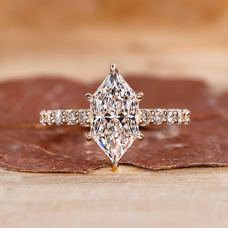 Hidden halo engagement ring with Dutch marquise engagement ring.