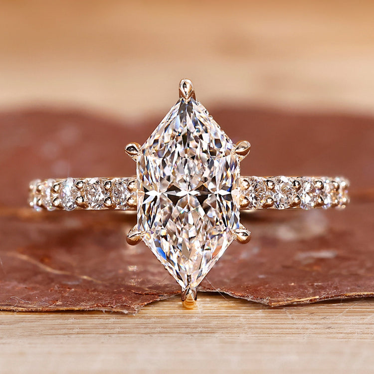 Hidden halo engagement ring with Dutch marquise engagement ring.
