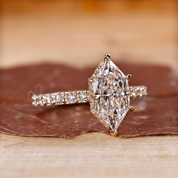 Dutch marquise engagement ring with pave setting ring.