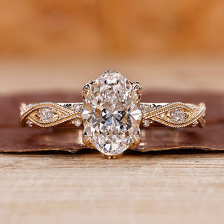 Oval shaped engagement ring with art deco ring.