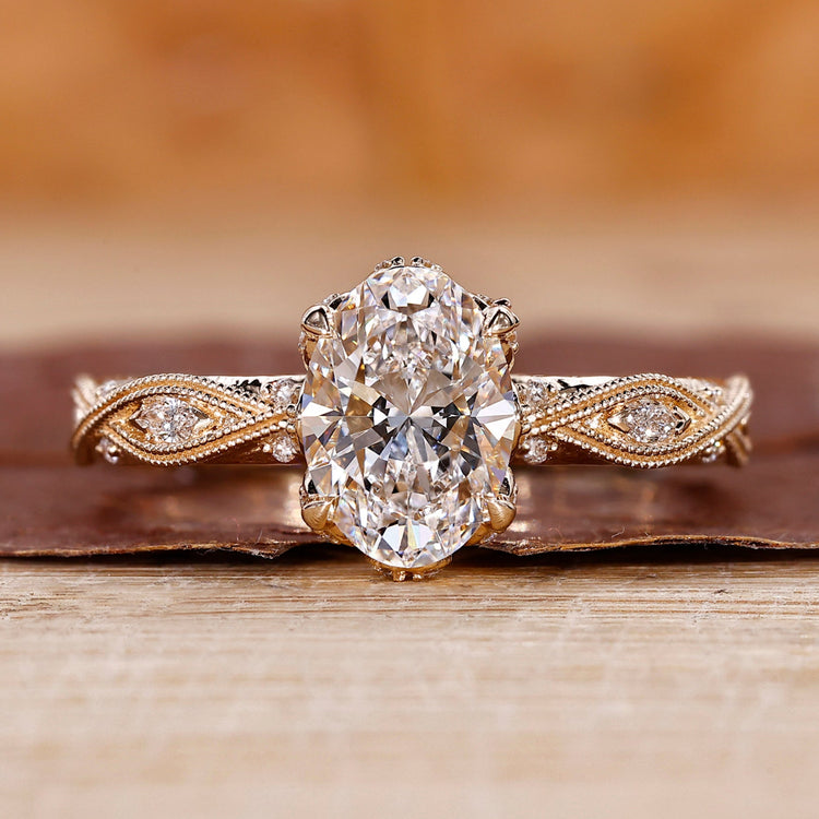 Oval shaped engagement ring with art deco ring.