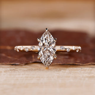 Round Cut Diamond Ring with flush pave setting in yellow gold.