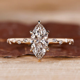 Round Cut Diamond Ring with flush pave setting in yellow gold.