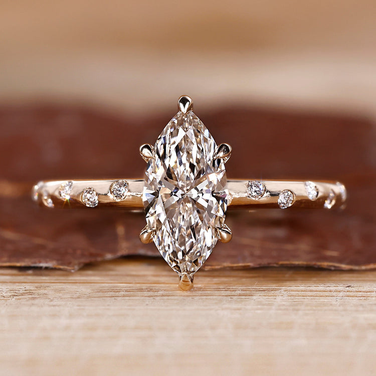 Round Cut Diamond Ring with flush pave setting in yellow gold.