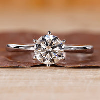 Solitaire engagement ring and round cut diamond ring.