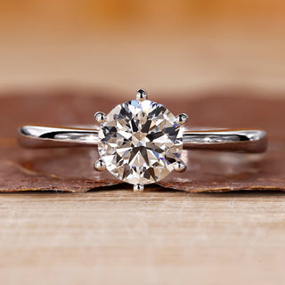 Solitaire engagement ring and round cut diamond ring.