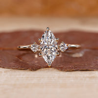 Marquise diamond engagement ring and 3 stone diamond ring.