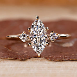 Marquise diamond engagement ring and 3 stone diamond ring.