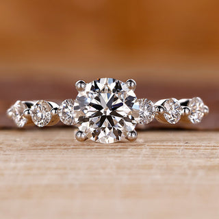 White gold engagement ring with 7 stone diamond engagement ring.
