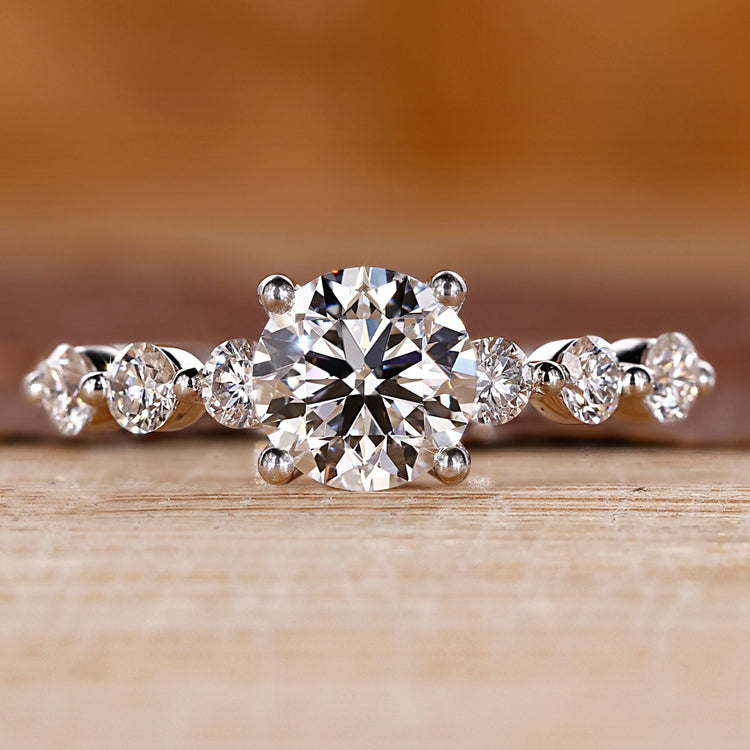 White gold engagement ring with 7 stone diamond engagement ring.
