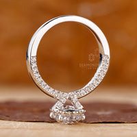Buy Engagement ring with oval side stone.