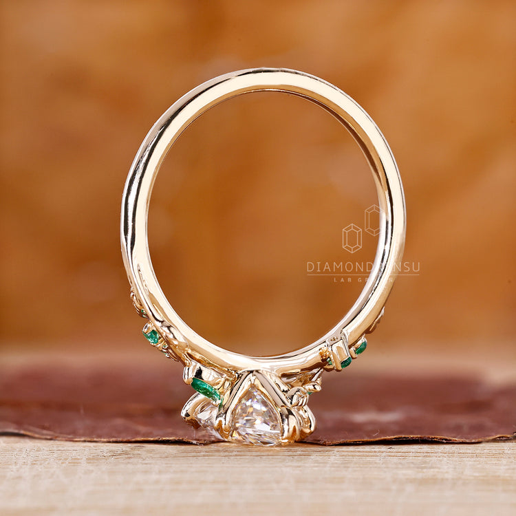 Customise ring using nature inspired engagement ring.