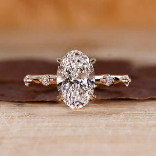 Oval Diamond Engagement Ring with round side stones and hidden halo.