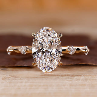 Oval Diamond Engagement Ring with round side stones and hidden halo.