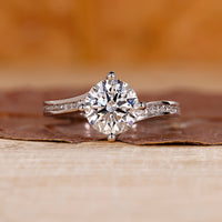 Round Diamond Engagement Ring with bypass setting ring.