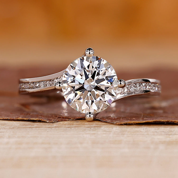 Round Diamond Engagement Ring with bypass setting ring.