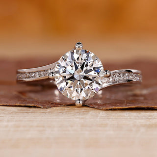 Round Diamond Engagement Ring with bypass setting ring.