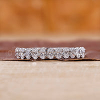 Half eternity diamond wedding band for her.