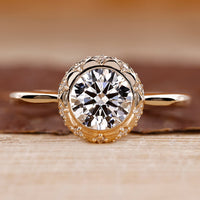 Round diamond engagement ring with vintage engagement ring.