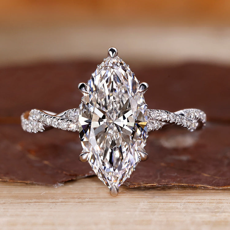 Twisted Pave Ring with marquise cut lab grown diamond.