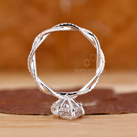 Hidden Halo Engagement Ring with marquise and round diamonds.